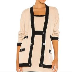 Sweater blazer with black outlines and black belt